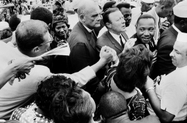 An enthusiastic "brotherhood" hand clasp after the "I HAVE A DREAM" speech - Mahalia Jackson, Dr. Eugene Carson Blake and Walter P Reuther, UAW. Lincoln Memorial, August 28, 1963. Price on request.