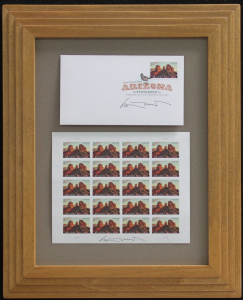 Arizona Centennial Commemorative Stamp, Arizona First Day of Issue by Ed Mell, signed twice with original signature. Custom frame with autographed stamps and First Day of Issue with Signature Frame, Desert tone finish 16 x 13 inches Price $500.00.