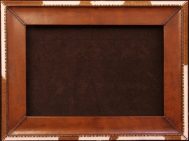 Handmade leather frame with cowhide trim. Hand stitched leather lacing, 6 inches wide, 24 x 36 in. opening, frame 36 x 48 inches. $1,800.00