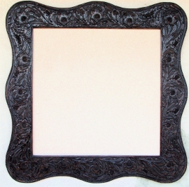 Western Dark Sienna Tooled Leather Frame, floral design with Serpentine shape, hand stitch edge lacing. Opening is 30 x 30 inches, frame size is 42.5 x 42.5 inches. $1,985.00