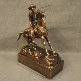 Cowboy Throwing Lariat Copper Statue, $2,500.00. This is an extremely rare copper patina statue, it is "mint condition, warehouse new," made in the 1940s by Owens Company that produced high end novelties and accessories for home and office. They produced numerous subjects, including a distinctive line of Western subjects. The Owens Company is the maker of the famous Oscars for the movie industry. I purchased the remaining warehouse inventory, which had been setting in inventory over fifty years. This is the last of a series of Western statues. I will be adding a few other different pieces over time. Inquires at Collier Gallery. Size: 13.5" High 9.5" Long 6" Wide, Very Heavy, shipping $120.00, Continental US