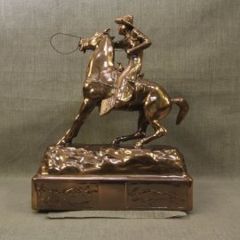 Cowboy Throwing Lariat Copper Statue, $2,500.00. This is an extremely rare copper patina statue, it is "mint condition, warehouse new," made in the 1940s by Owens Company that produced high end novelties and accessories for home and office. They produced numerous subjects, including a distinctive line of Western subjects. The Owens Company is the maker of the famous Oscars for the movie industry. I purchased the remaining warehouse inventory, which had been setting in inventory over fifty years. This is the last of a series of Western statues. I will be adding a few other different pieces over time. Inquires at Collier Gallery. Size: 13.5" High 9.5" Long 6" Wide, Very Heavy, shipping $120.00, Continental US
